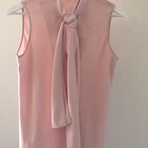 Sleeveless tie front top.